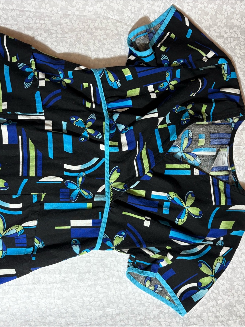 SB Scrubs Black Short Sleeve Top with Blue and Green Geometric Butterfly Print
